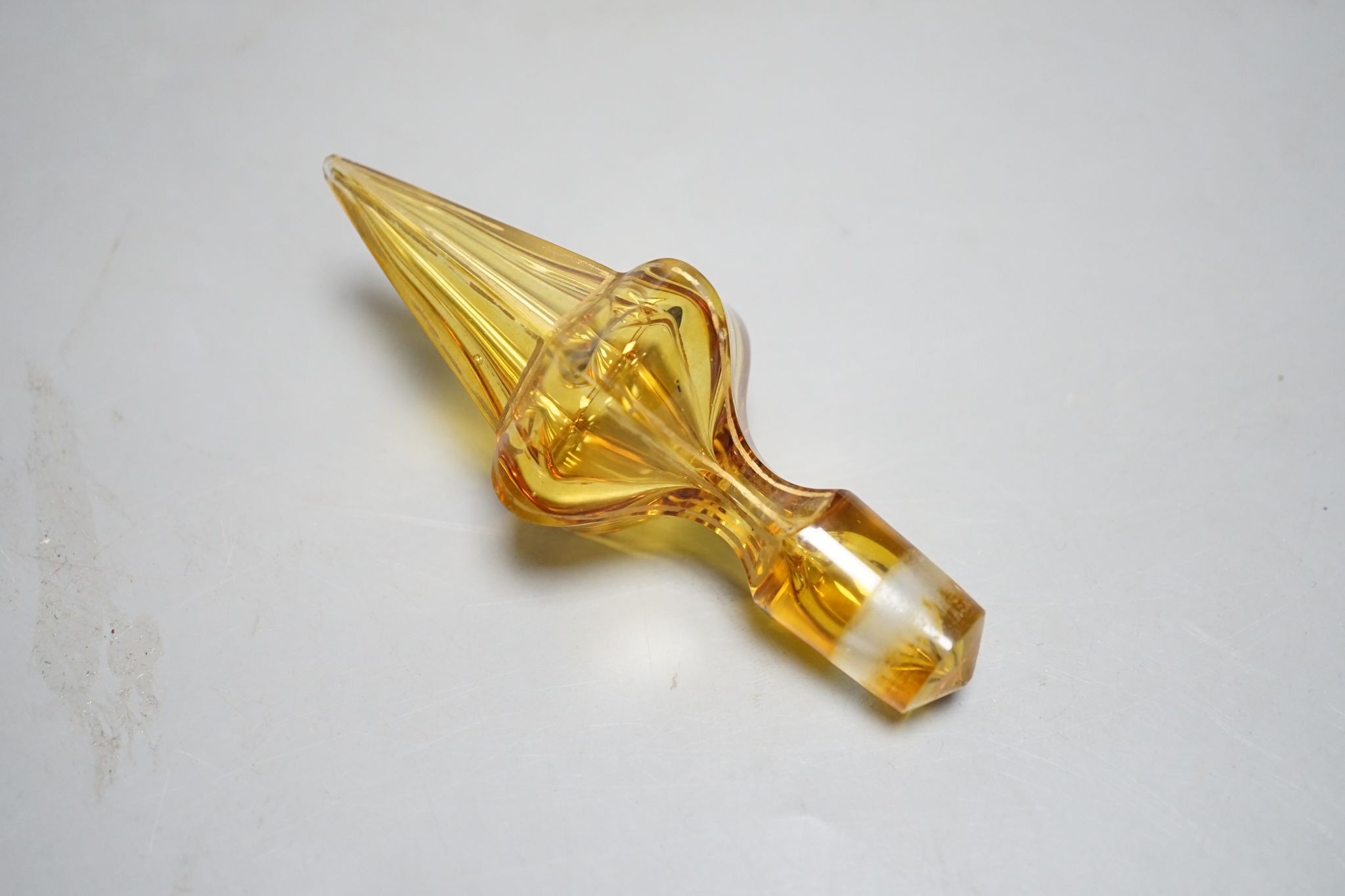 A Bohemian overlaid glass scent bottle, late 19th century, 26 cms high including stopper.